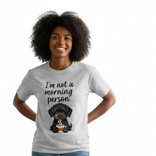 Person wearing a white t-shirt with text and a graphic, standing against a white background